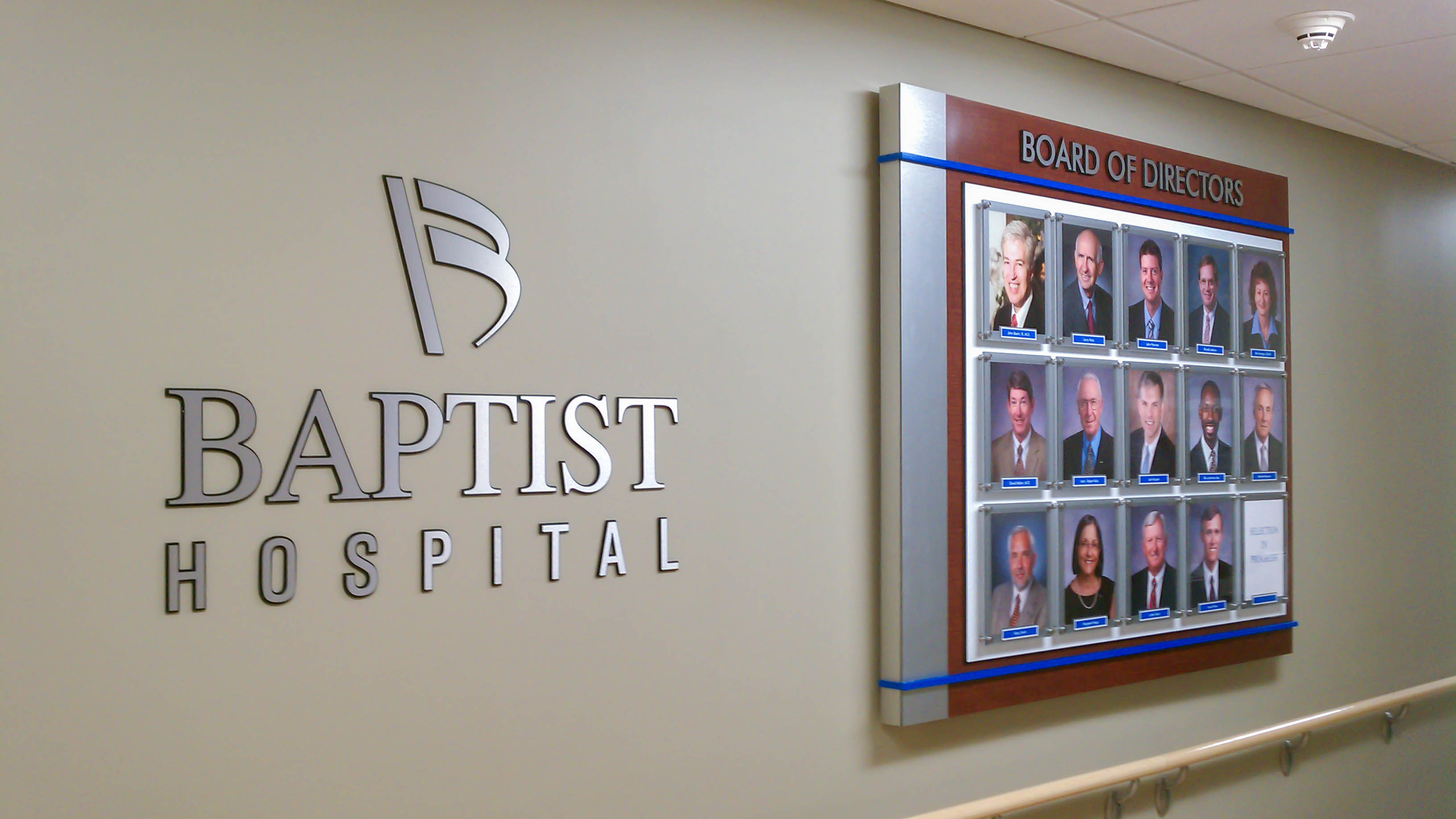 Interior board of directors photo display and dimensional lettering for Baptist Hospital - signgeek Branded Environments 