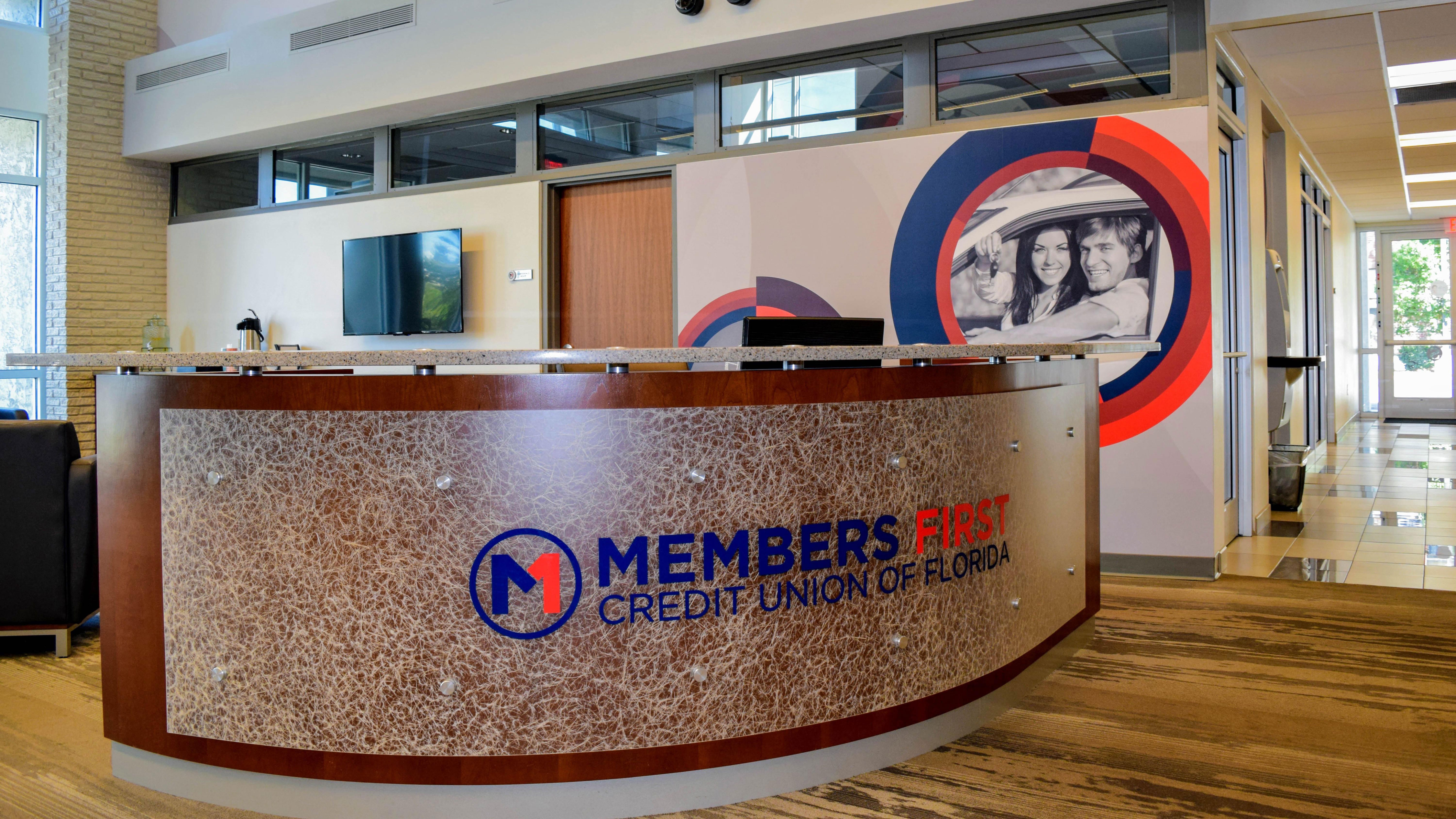 Branded environment at Members First Credit Union - signgeek Environmental Graphics and Signage