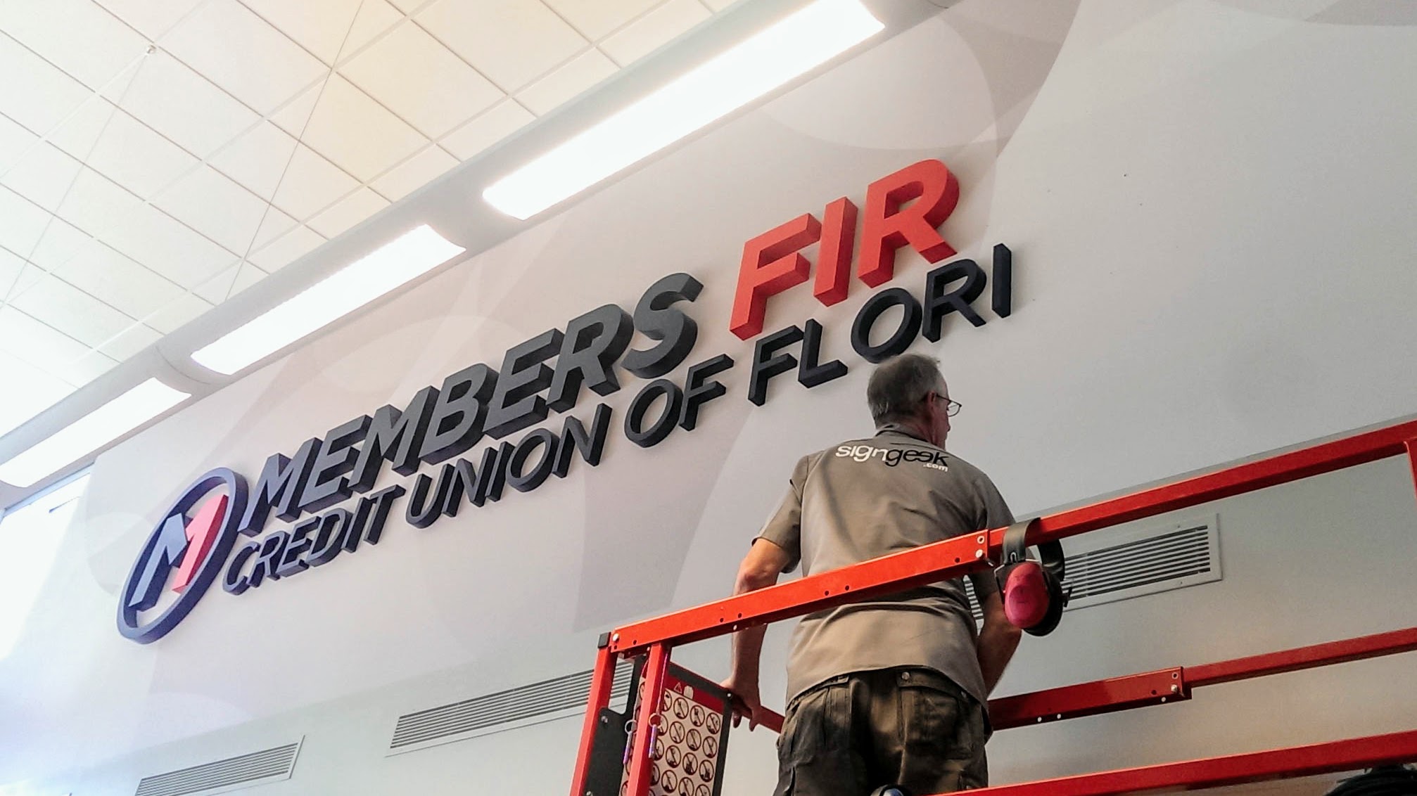 Branded environment at Members First Credit Union - signgeek Environmental Graphics and Dimensional Letters