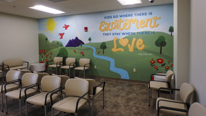 Office lobby wall wrap at Community Health of Northwest Florida - Signgeek Environmental Graphics 