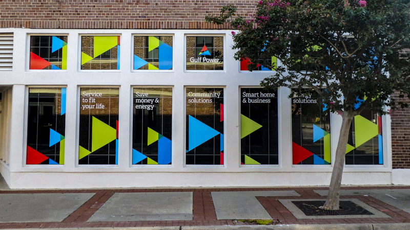 Window graphics for Gulf Power in Downtown Pensacola - Signgeek Environmental Graphics 